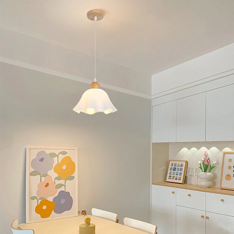 Ozawa flower pendant light in minimalist dining room.