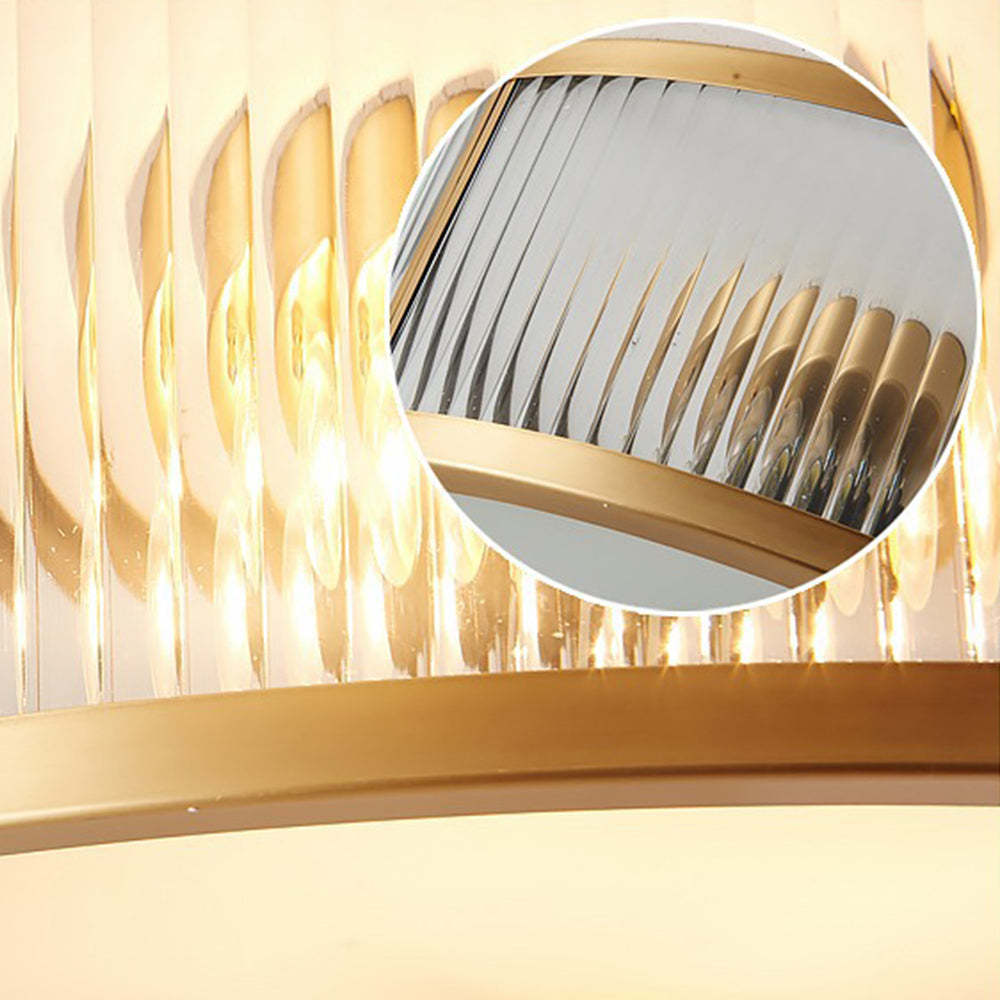 Close-up of gold Alessio flush mount ceiling light glass detail