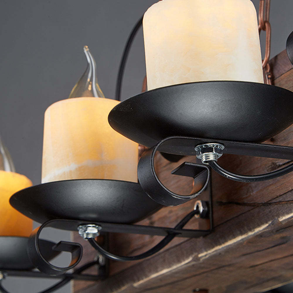 Close-up of Austin pendant light's candle-style bulbs and wood