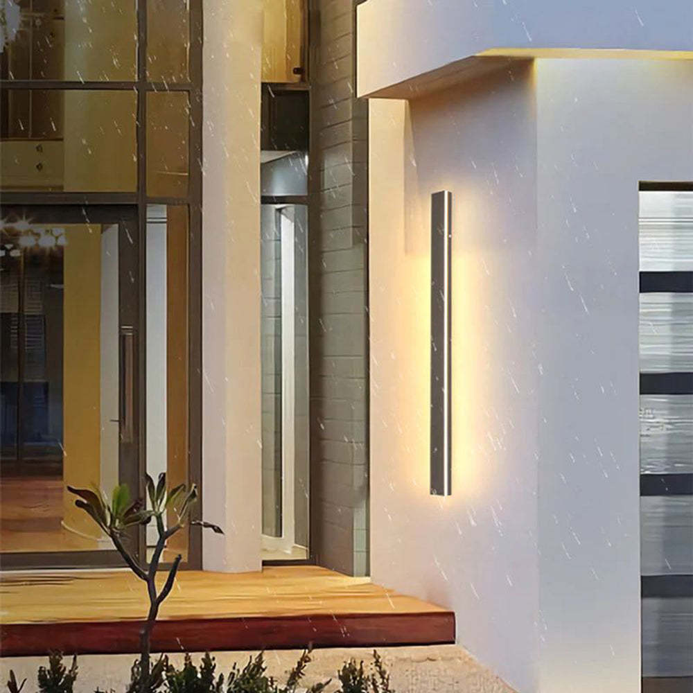 Edge linear wall light illuminating modern home exterior