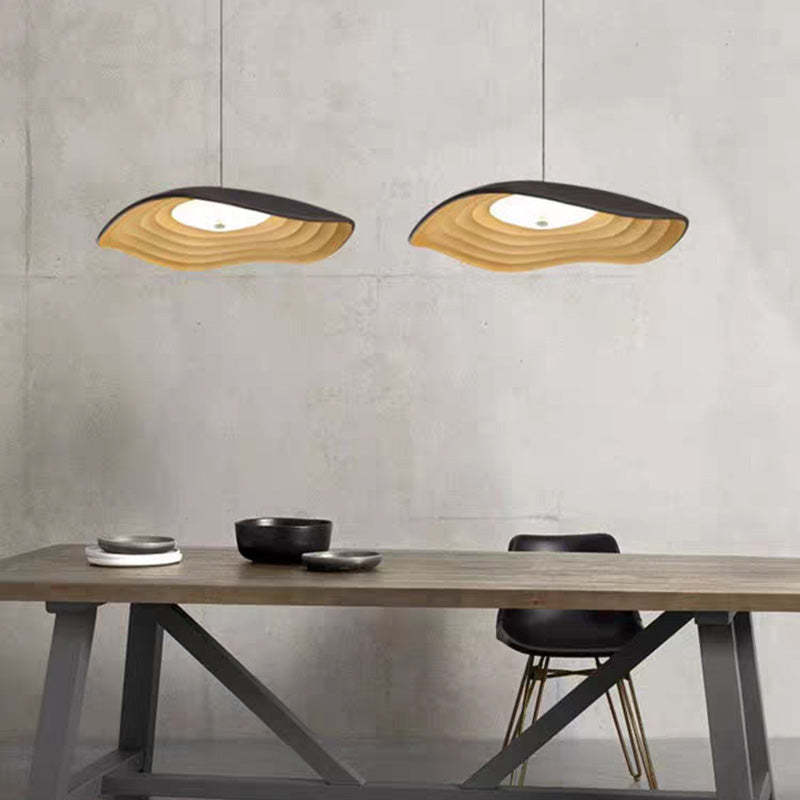 Carins Wabi-Sabi LED pendant lights over dining table