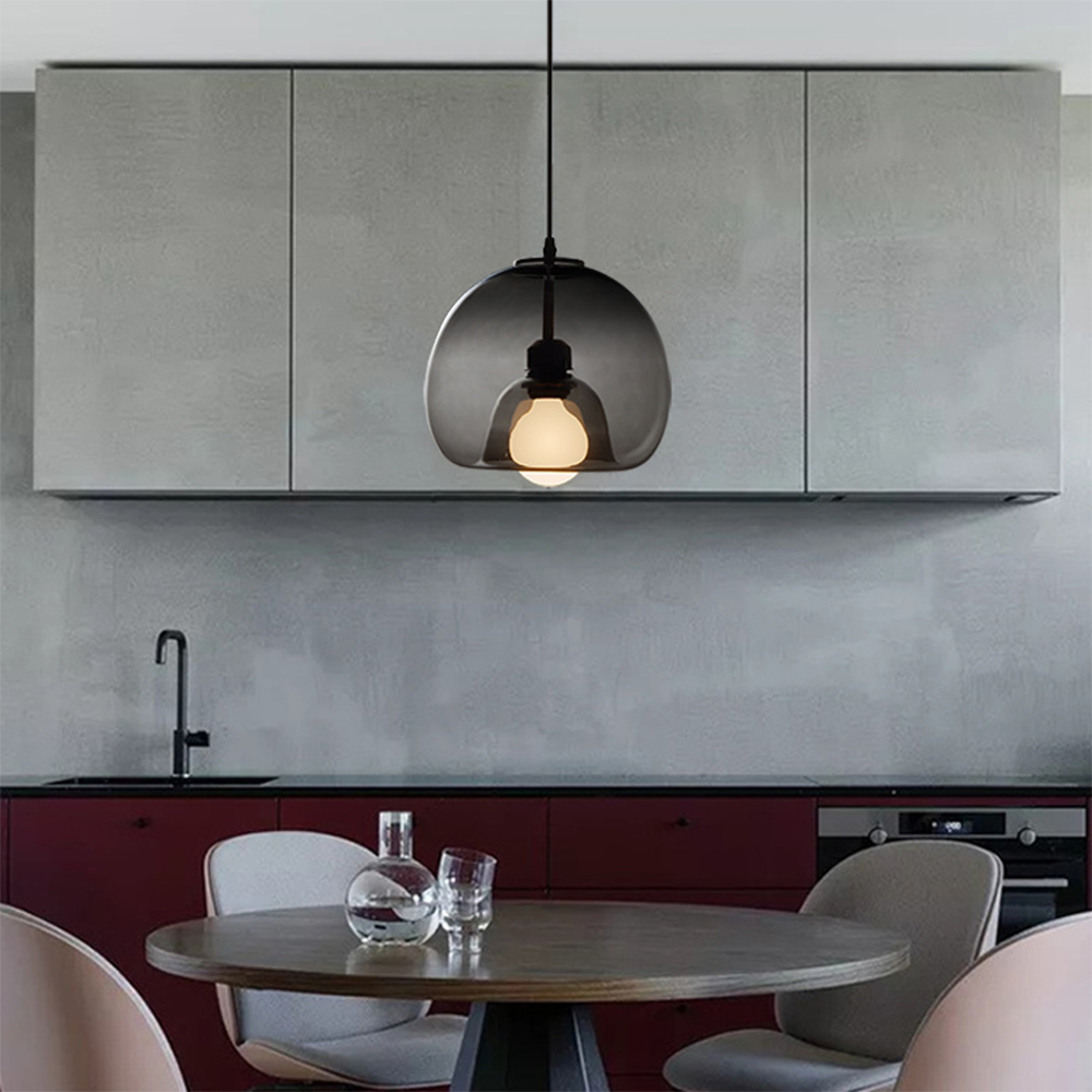 Smoky gray globe glass pendant light in modern kitchen