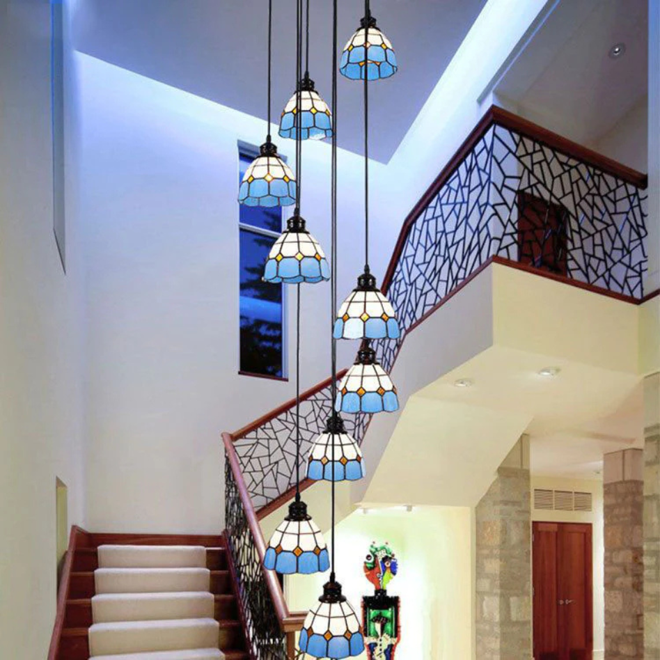 Blue and White Glass Chandelier above Staircase