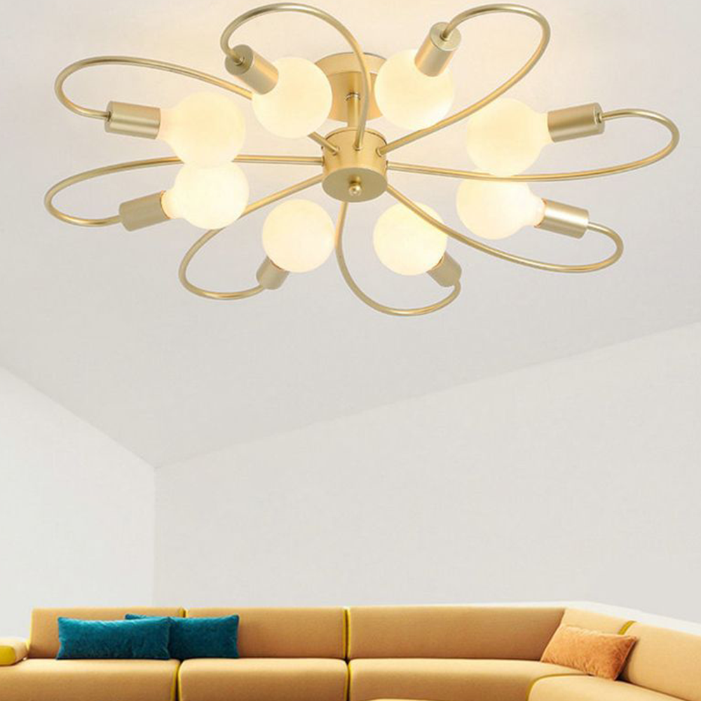 Gold metal flush mount ceiling light in a living room setting