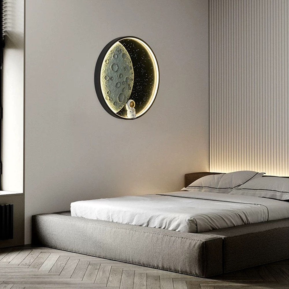 Elif Astronaut Moon Lamp above bed. Kids room wall lighting.