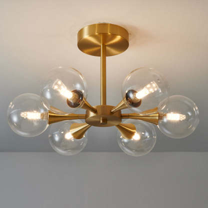 Valentina pendant light with clear glass bulbs and brass fixture