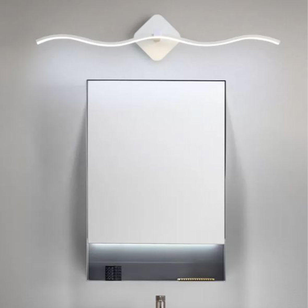 Louise Wave Wall Lamp above bathroom mirror.