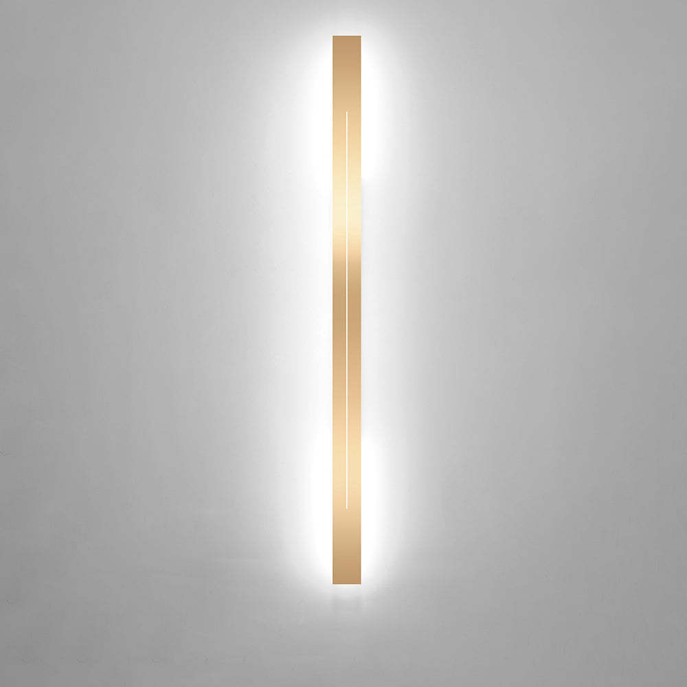 Edge Modern Gold LED Wall Lamp on gray wall, Lassola Lighting