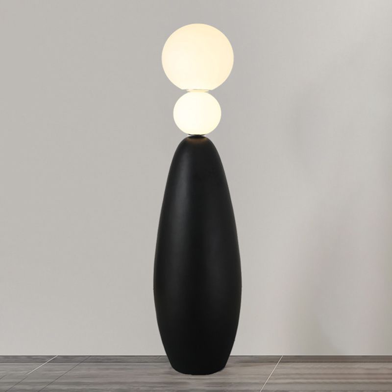 Valentina modern ball floor lamp: resin base, glass spheres.