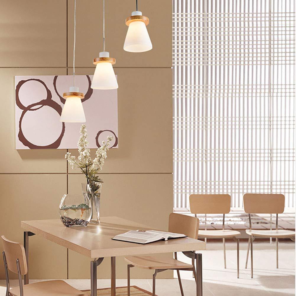 Hailie pendant lights over dining table