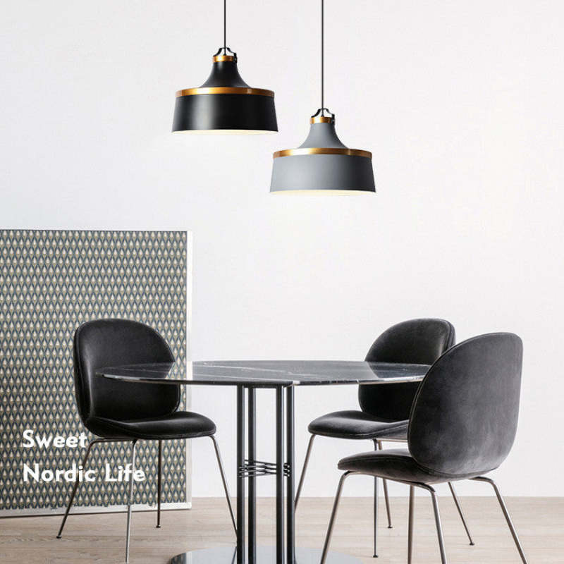 Morandi pendant lights over a Nordic style dining table