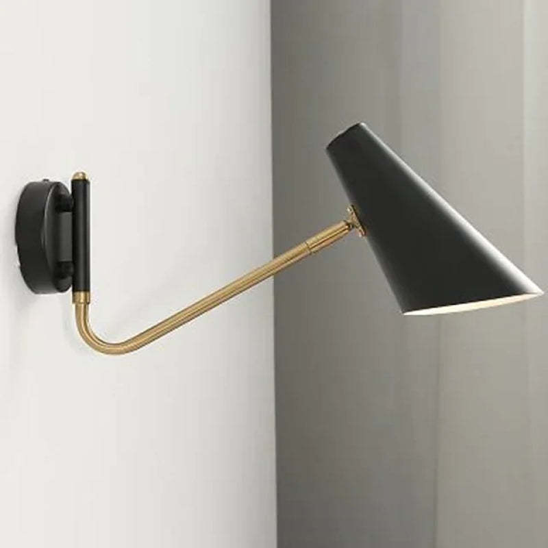 Brady black metal LED wall lamp. Rotatable lamp for study room