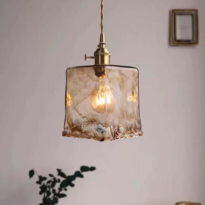 Levy vintage pendant light with caramel square glass shade.