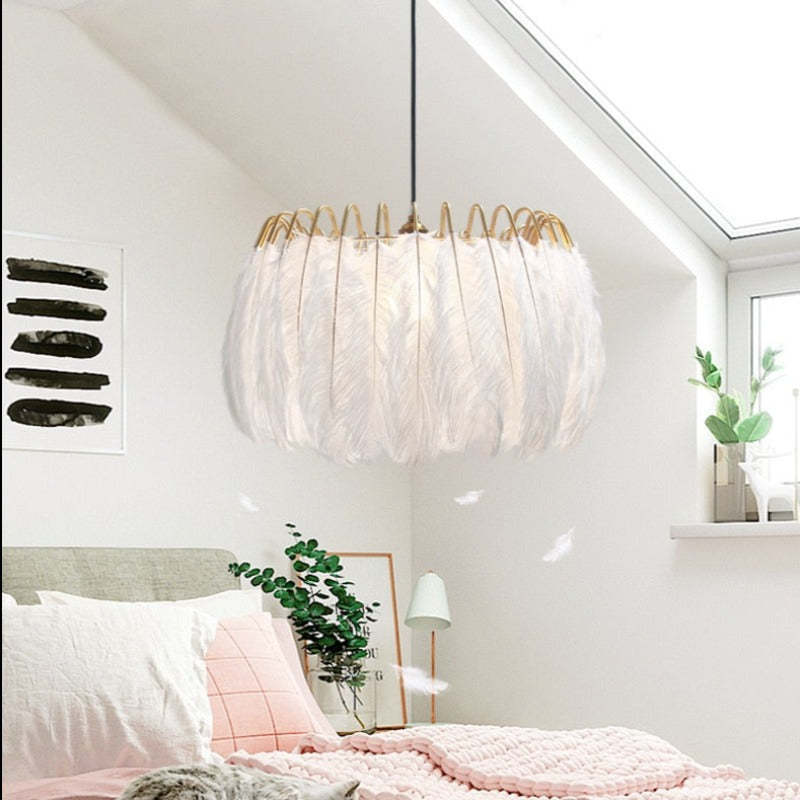 White feather pendant light in bedroom setting