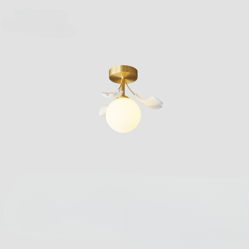 Olivia Chandelier with leaf accents, gold finish and globe bulb