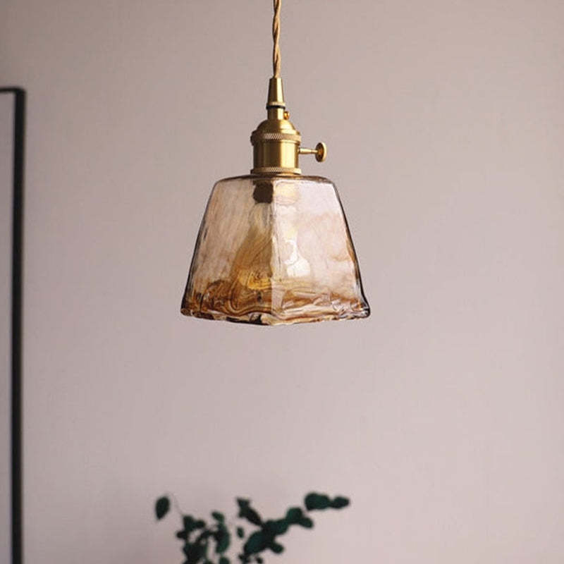 Levy caramel glass industrial pendant light fixture.