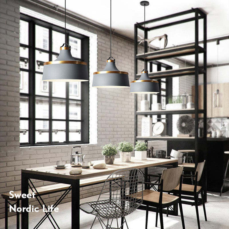 Gray Morandi pendant lights illuminate Nordic dining space, Las Sola