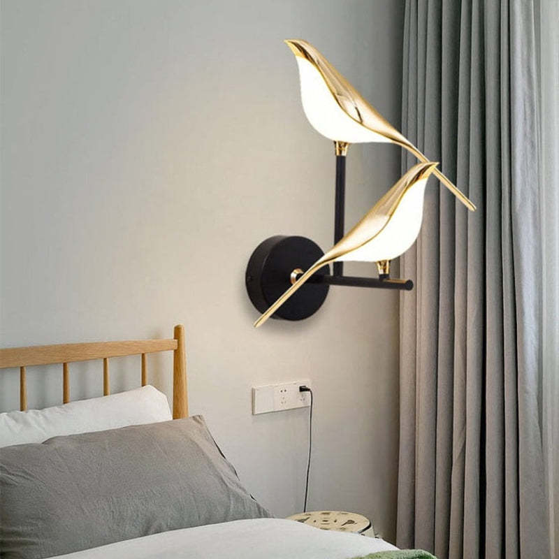 Clifford gold magpie wall lamp in bedroom