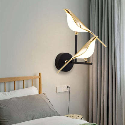 Clifford gold magpie wall lamp in bedroom