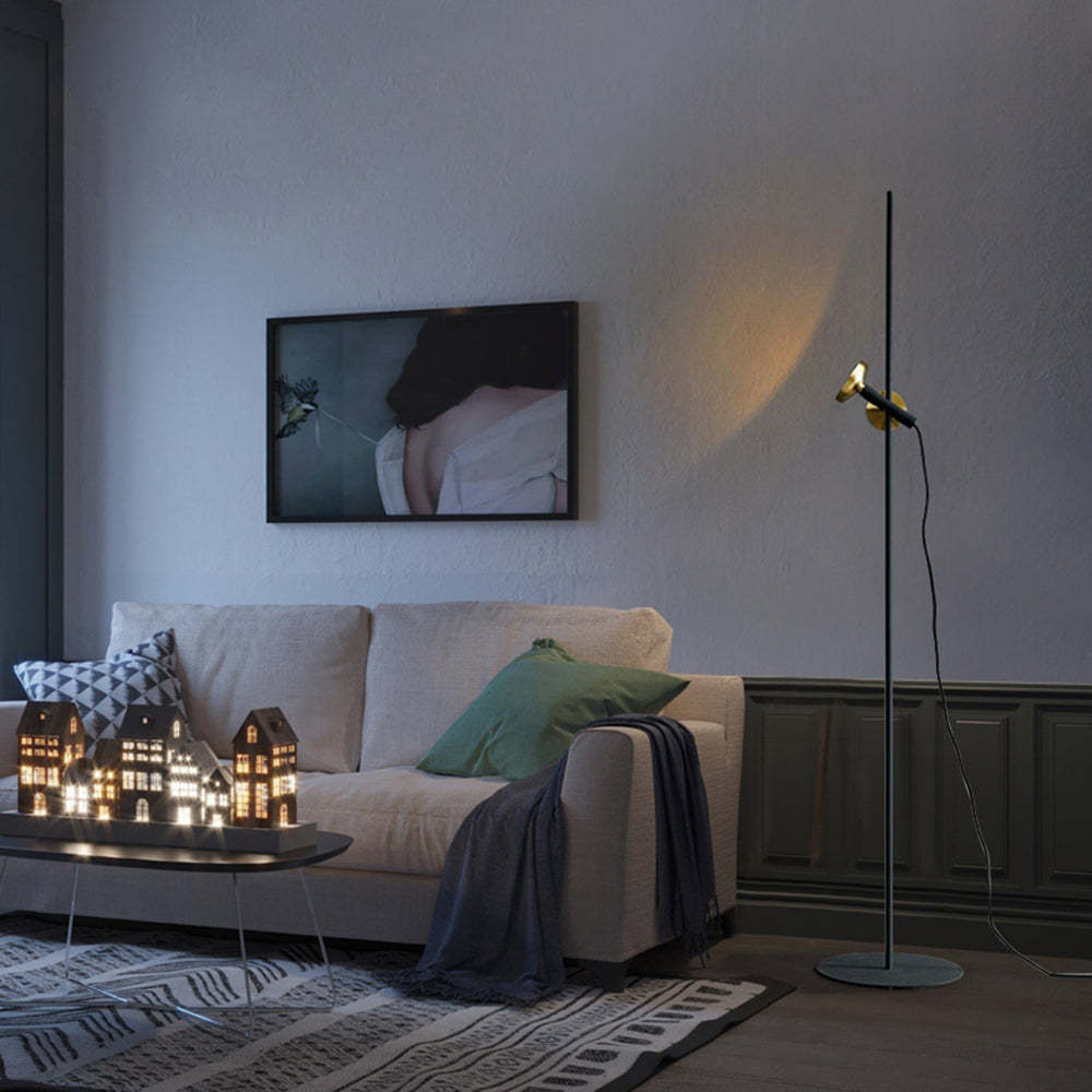 Salgado Floor Lamp illuminating a living room setting