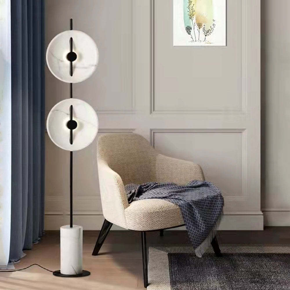 Salgado floor lamp with marble shades in living room