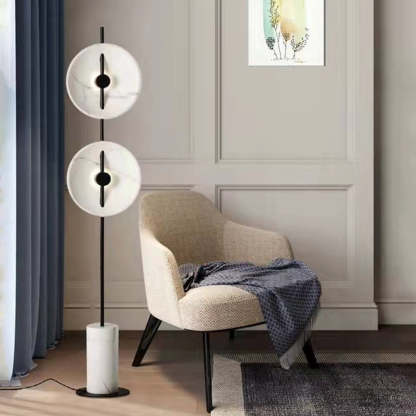 Salgado floor lamp with marble shades in living room