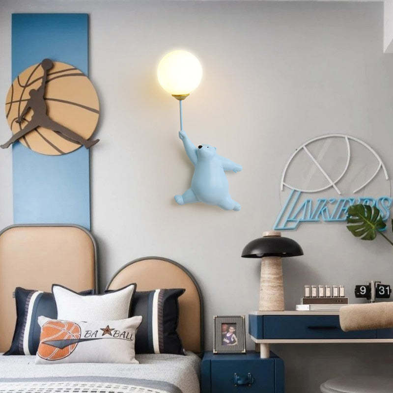 Bear balloon wall lamp in a kids room with basketball decor.