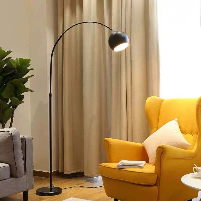 Morandi arc floor lamp in living room setting Morandi Modern Fishing 1 Light Arc Floor Lamp Metal