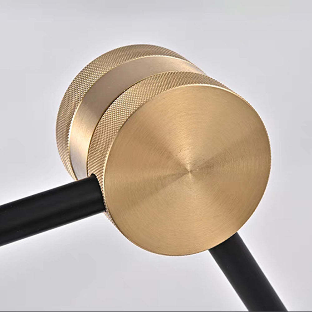 Detailed view of Cairns floor lamp joint with black pole and brass detail