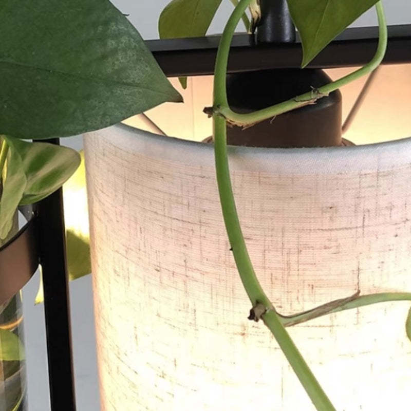 Close-up of greenery on Nest Barrel Pendant Light