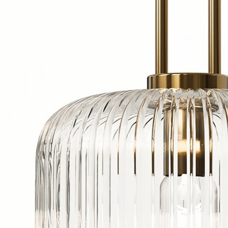 Close-up of Sanna ribbed glass pendant light with gold accents