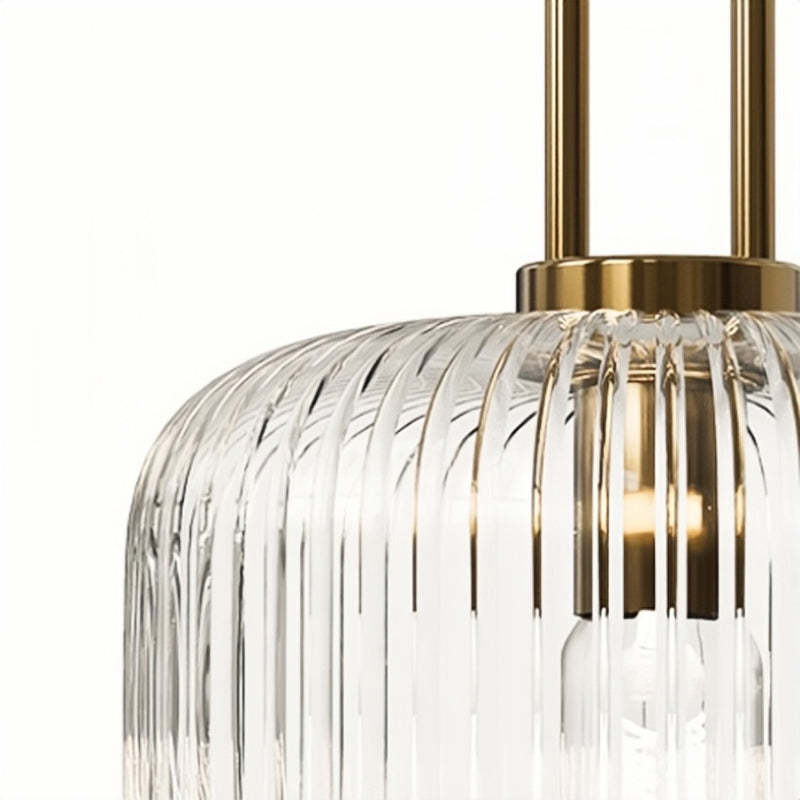Close-up of Sanna ribbed glass pendant light with gold accents