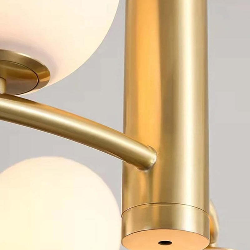 Gold metal and glass orb detail of Valentina Nordic Pendant Light