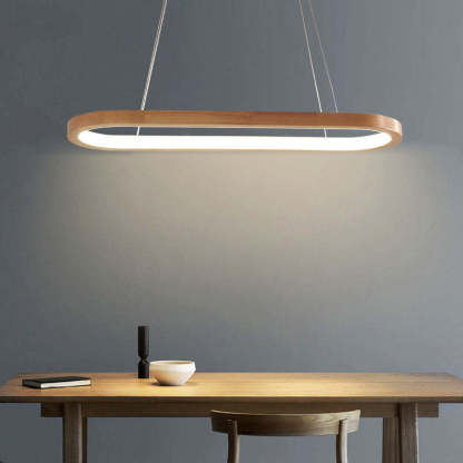 Ozawa oval pendant light above dining table