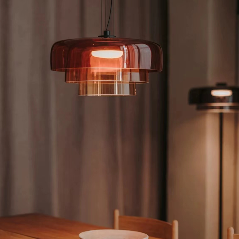 Morandi Orange Pendant Light above a dining table.