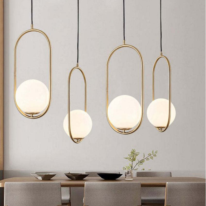 Valentina Gold Pendant Lights over dining table