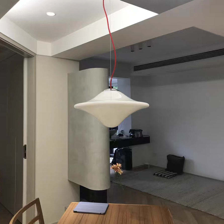 Hailie UFO pendant light in a modern study or bedroom setting