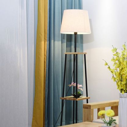 Eryn floor lamp: fabric shade & shelves for decor.