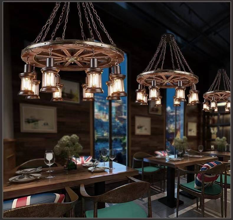 Dining room with Austin wood & metal wheel pendant lighting.