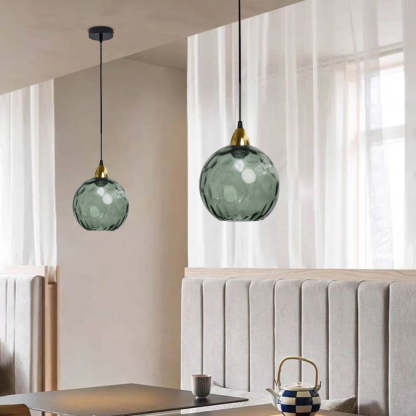 Gray Hailie glass pendant lights in dining room. Modern lighting.