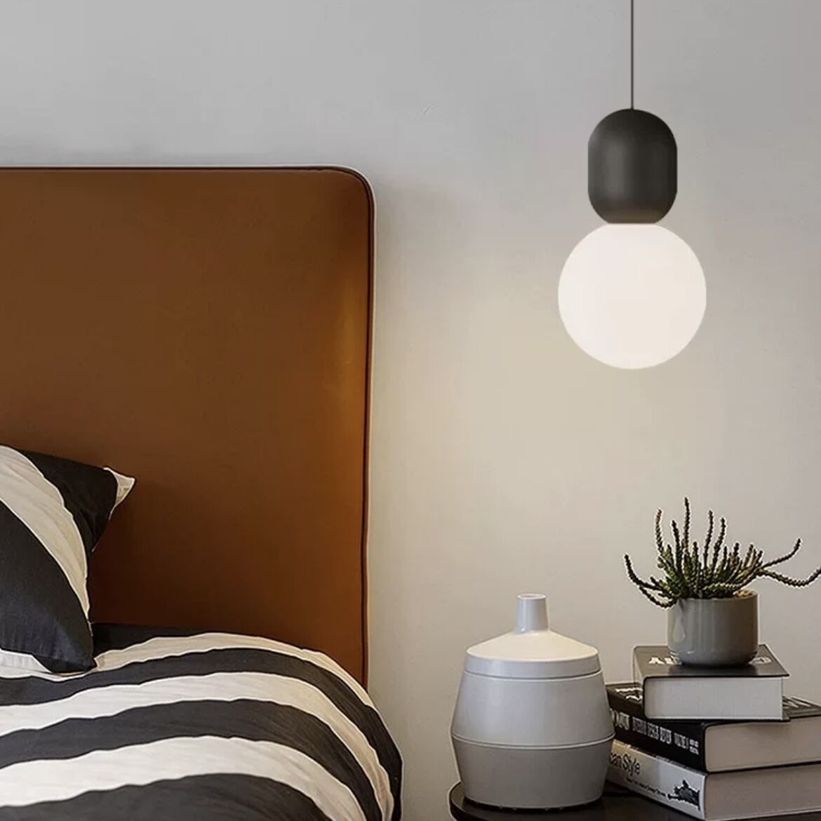 Modern Hailie pendant light in bedroom setting