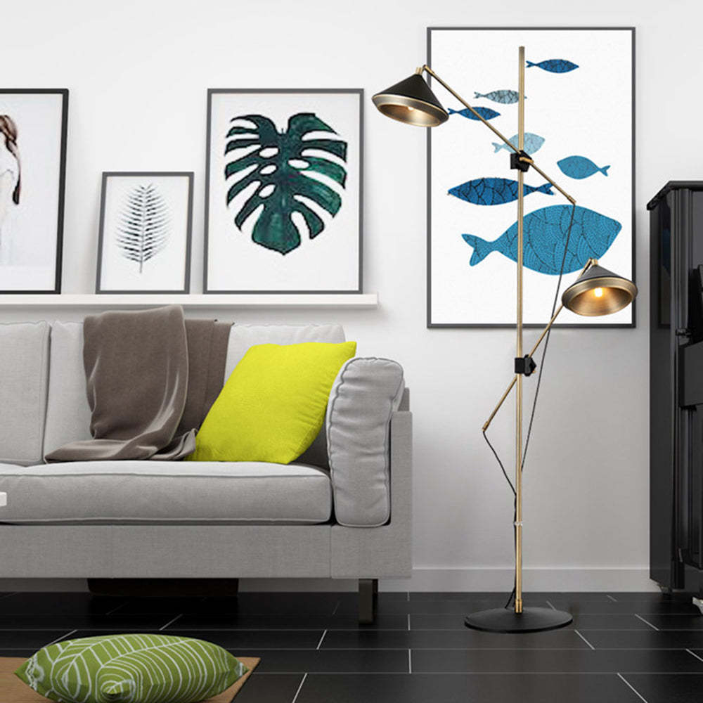 Carins brass floor lamp in a living room setting, minimalist design