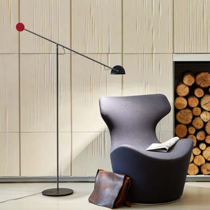 Minimalist metal floor lamp with industrial design.