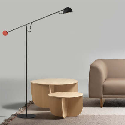 Avi minimalist metal floor lamp in living room setting.