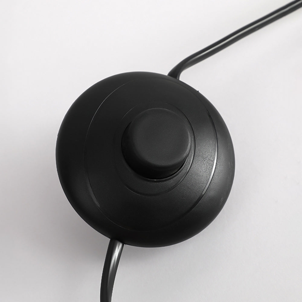 Avi floor lamp: close up of black foot switch.