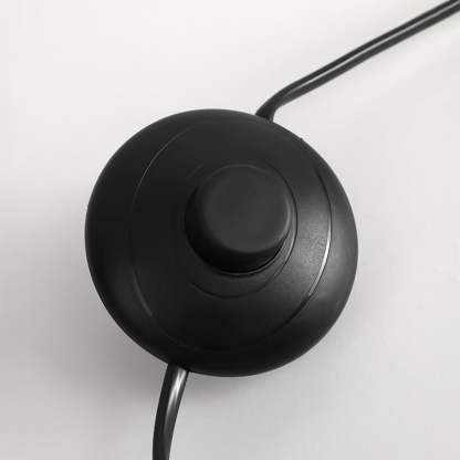 Avi floor lamp: close up of black foot switch.