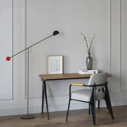 Avi Industrial minimalist floor lamp near desk with Basquiat book.