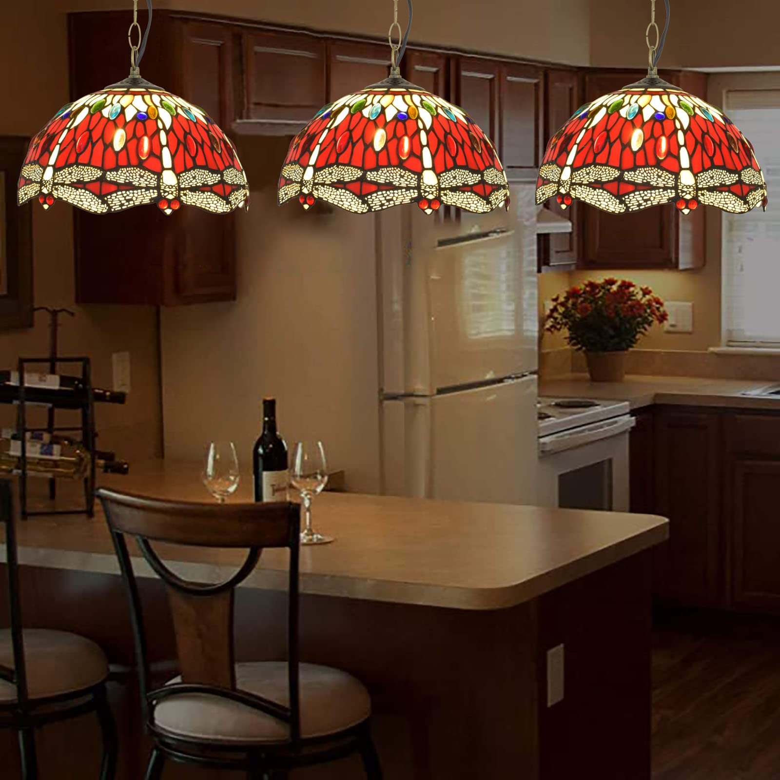 Red dragonfly pendant lights in kitchen