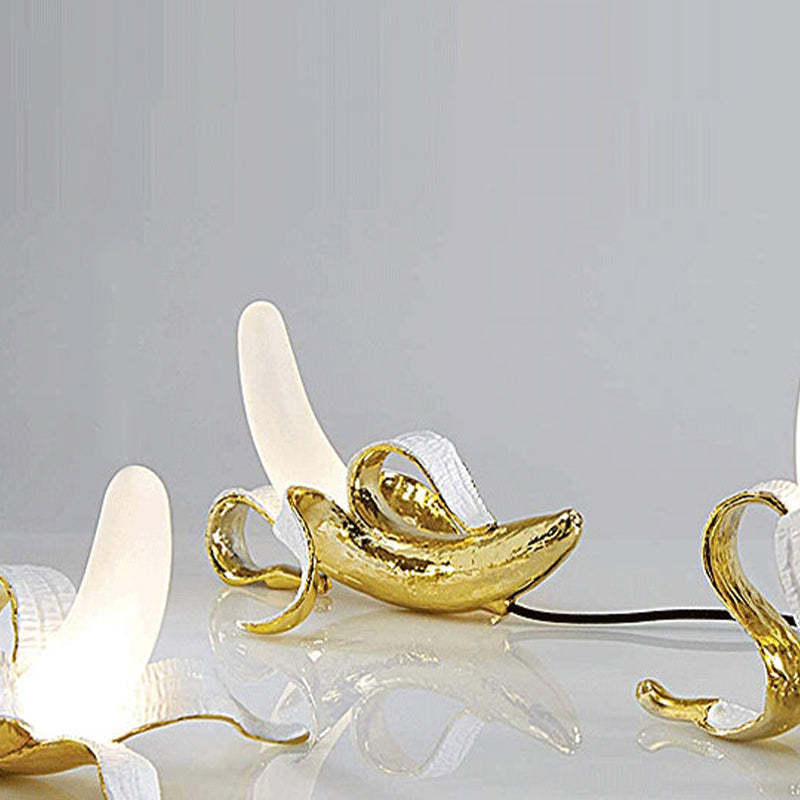 Celesta Banana Lamp: gold and white art lighting
