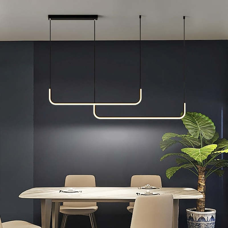 Edge linear pendant light over modern dining table